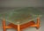 Unique coffee table that seems to combine both Art Deco and Brutalist styles. The piece is a successful combination of the...