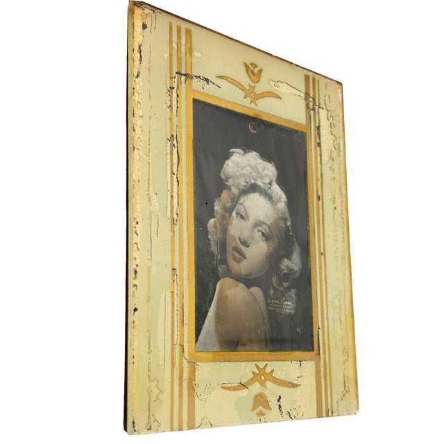 Art Deco era mirrored glass 4x5 picture frame. This mirrored surface utilizes a silver nitrate technique on glass with...