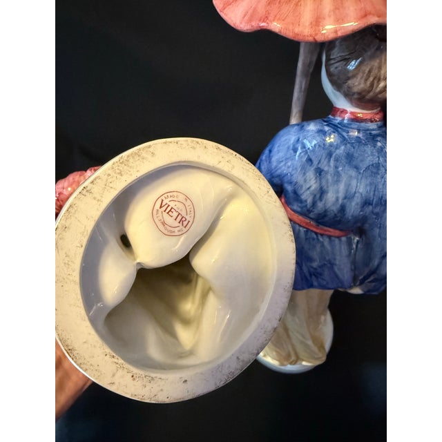 Delightful mid-century pair of hand-painted porcelain figurines from Vietri sul Mare, Italy, depicting a traditional Asian...