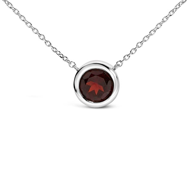 Imbued with captivating radiance, this exquisite pendant necklace combines the timeless allure of .925 sterling silver...