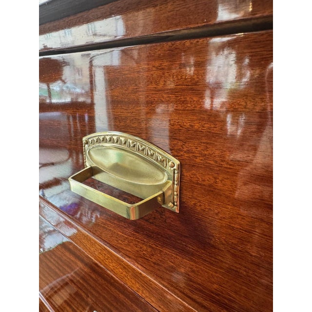 Elegant Art Nouveau cabinet circa 1910 Mahogany, original brass fittings, interior with 3 drawers and two open...