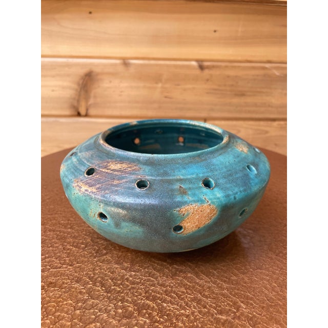 I love the rich multi-hued blue color and aged texture of this vintage bowl, handcrafted and signed on bottom.