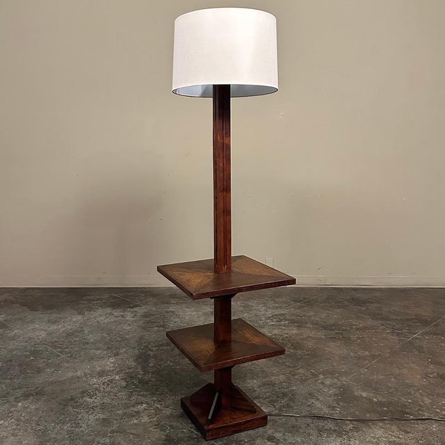 Mid-Century Modern Wood Floor Lamp makes a handsome statement, ideal for the family room or a svelte office environment....