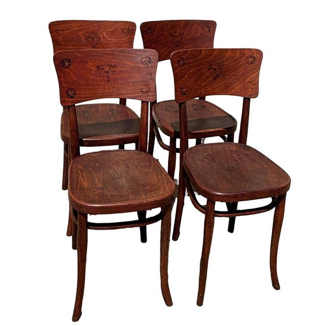 Victorian era Thonet Hermanos side chair featuring an elegant, sculptural frame crafted from warm-toned bentwood with an...