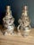 A pair of snowman salt and pepper shakers by International Silver Company, finished in bright silverplate. Both shakers...