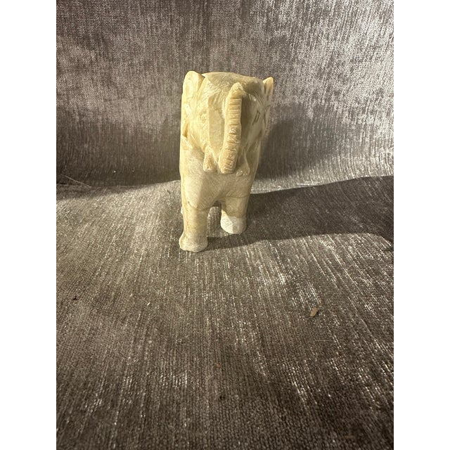 Beautiful hand carved elephant sculpture, likely from India or Mexico in origin. Elephants often symbolize good luck,...