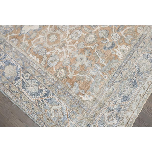 An early 20th Century Mahal Carpet in earth tones
