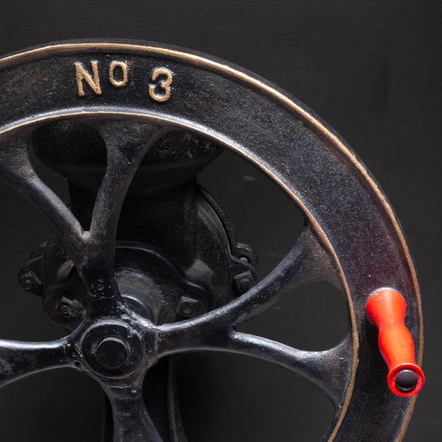 ABOUT An antique, cast iron coffee grinder showcases the craftsmanship of the late 19th/early 20th century. Model #8...