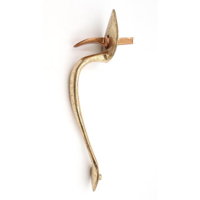 Colonial style polished brass door handle with spade back plates and a thumb latch. The original mounting screws are not...