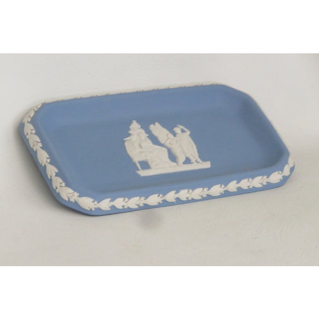 This gorgeous trinket dish is made of ceramic. This piece is stamped as being made by Wedgwood in England, see pictures,...