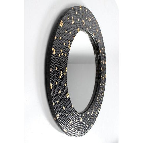 Large round mirror with mosaic from the 50’s. The mirror has a large frame with beautiful mosaic tiles in black and gold....