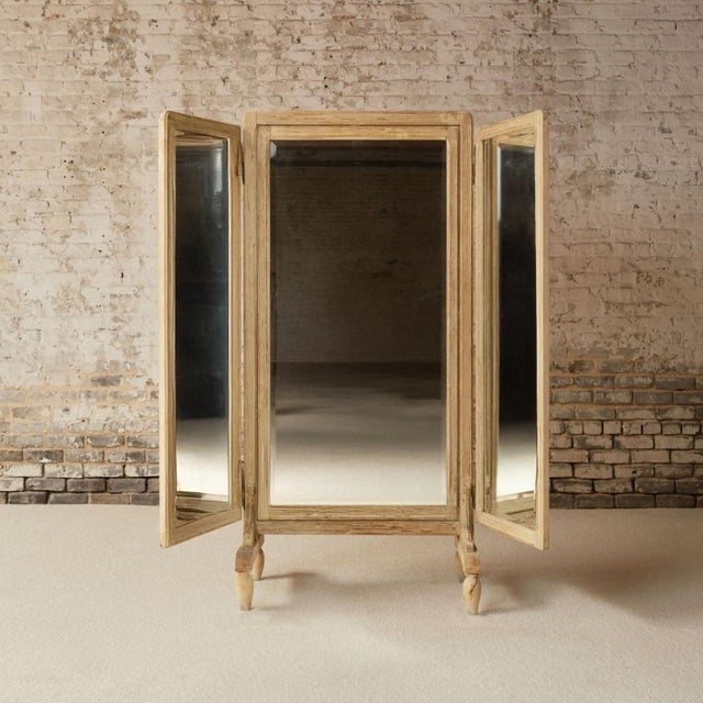Add rustic elegance and functional beauty to your space with this 19th century French oak floor mirror, a beautifully...