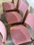 This vintage set of 6 dining chairs showcases a classic organic profile with gently curved backrests and floating seats....