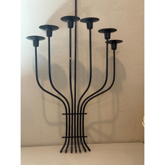 Mid Century Candle Sconce in the style of Tommi Parzinger. Classic 6 light design to jazz up your walls and make a...