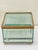 Superb rectangular jewelry box in clear glass with a gilt brass mount, resting on four small ball feet. Hinged glass lid...