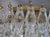 Elegant Italian ceiling light made from 84 beautiful Murano trasparent glasses "poliedri". Structure in gold and brass...