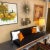 Mid century modern Brutalist wall sculpture by featuring a country road seen with trees, a barn door and several...