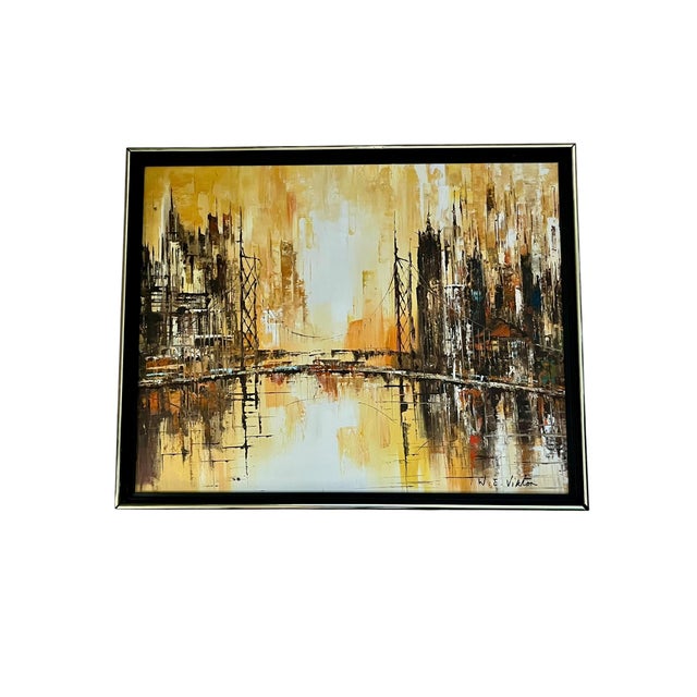 A striking abstract cityscape painting rendered in rich gold, amber, cream, and deep espresso tones. The composition...