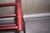 19th Century Victorian towel rack, red painted wood, turned legs in spool design, approx. 36" Wide x 24"High x 8"Deep. The...