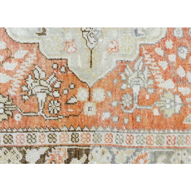 The Vintage Turkish Oushak Rug is a handwoven masterpiece, crafted with care using wool on a wool foundation in the Oushak...