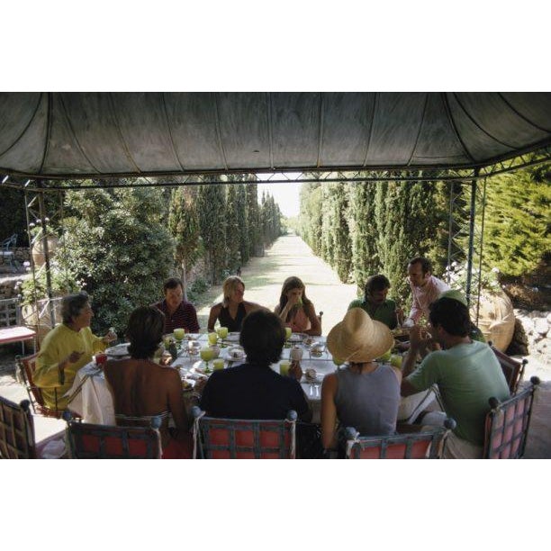 Lunch With Lili 1973 Lunch at Marchesa Lili Gerini’s home, Santa Liberata, in Porto Ercole, August 1973. (Photo by Slim...