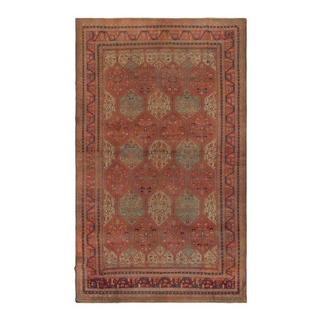 An antique Turkish Anatolian rug, handwoven in wool circa 1900, measuring 10x15. This piece exemplifies the enduring...