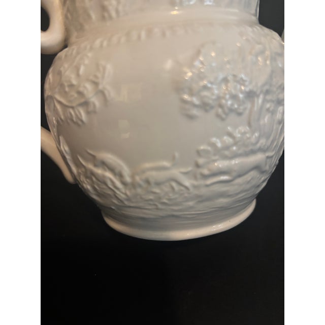 Bring the storied charm of an English country estate into your space with this vintage relief-molded creamware teapot and...