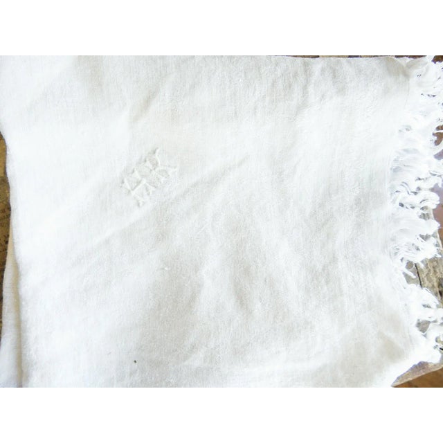 Antique early 20th century set of 8 white cotton damask fringed napkins. Hand embroidered monogram HK, few small scattered...