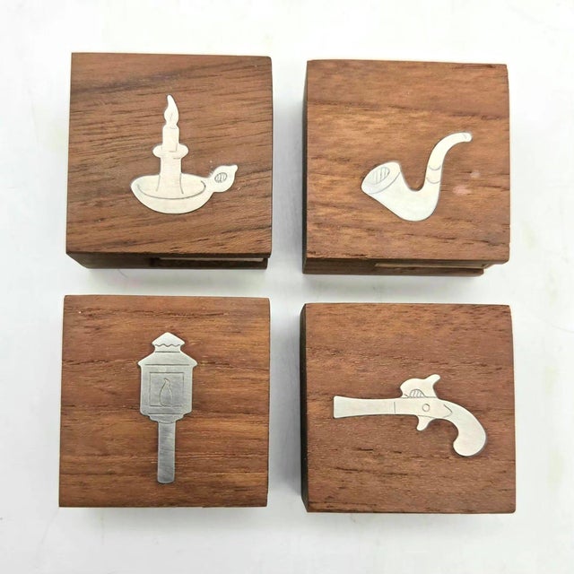 Offered are 4 vintage mid 20th Century Teak wood matchbox holders that have pewter inlay on their surfaces, designed by...