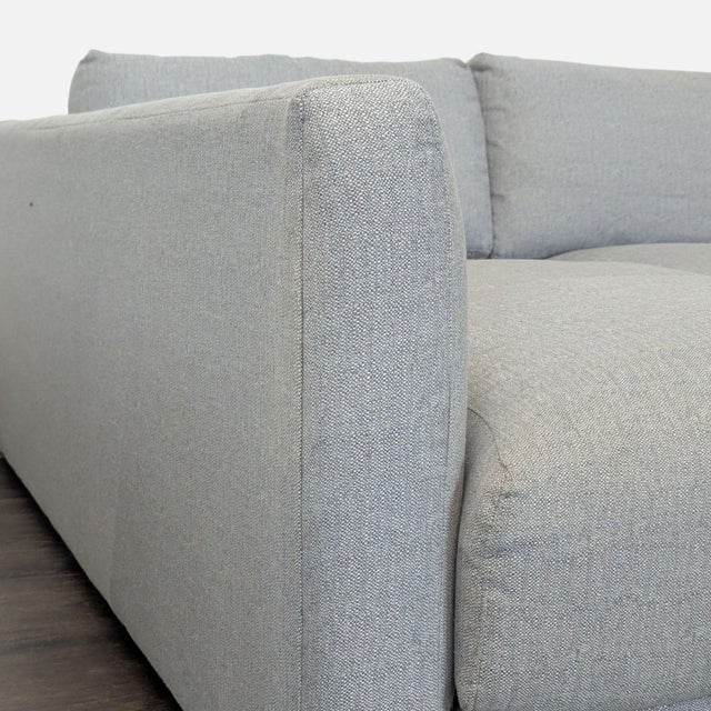 This Room & Board sectional offers a clean, modern look in a soft gray fabric. Features a spacious chaise for lounging and...