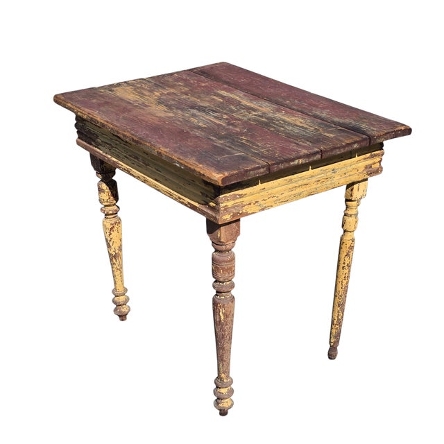 Early American turned legged, side tables. Wonderful old paint, buttery yellow over green. Four board top. Mismatched legs...