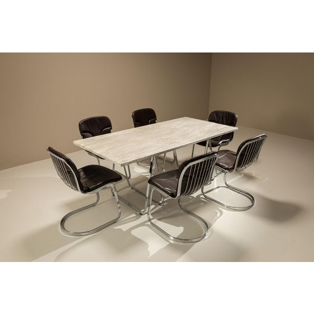 The table reflects a period in which designers increasingly turned towards structural honesty. Marble, long associated...