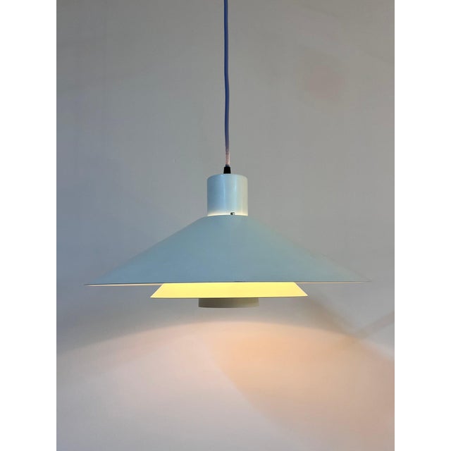 The Trapez louvered lamp is an architectural masterpiece by Danish architect Christian Hvidt, designed in the 1970s for...