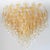 Italian chandelier shown with amber and clear Murano glasses hand blown to form beautiful dangling stalactite shaped...