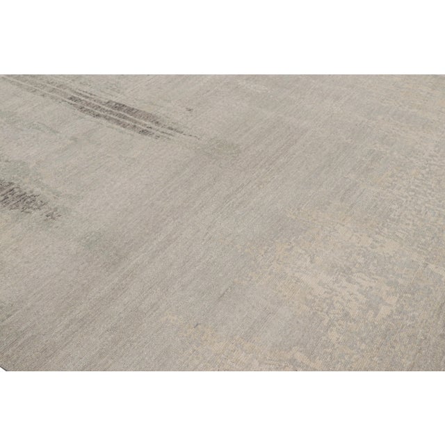 Hand-knotted in wool, this 8x10 modern rug, originating from India, is inspired by modern art with an abstract pattern and...