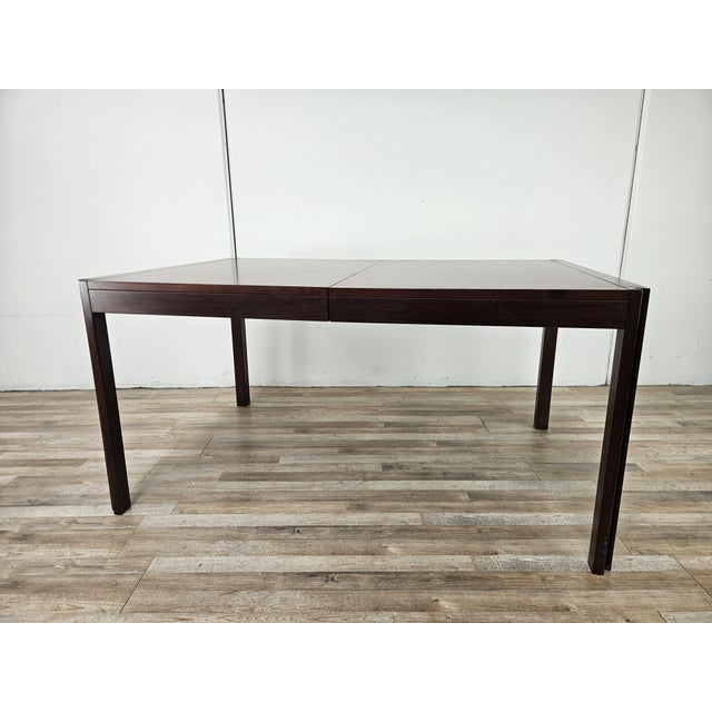 The elegant "4d" dining table, designed by angelo mangiarotti and produced by molteni, is part of the celebrated 4d...