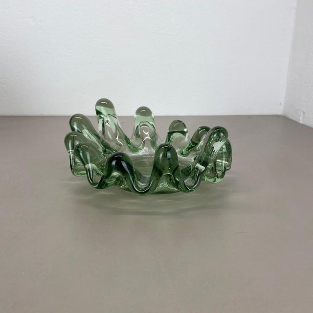 Article: glass bowl shell element Origin: France Decade: 1970s This original vintage glass bowl element was produced in...