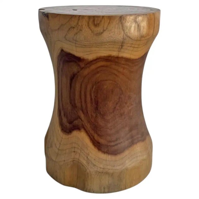 Crafted from solid teak wood, this side table showcases natural grain patterns and a warm, organic finish that makes each...