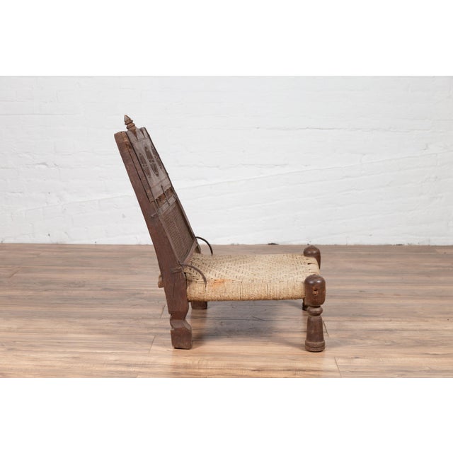 Rustic Antique Indian Rustic Low Seat Wooden Chair with Carved Rosettes and Twine Seat For Sale - Image 3 of 12