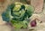 Watercolor with collage by Charlottesville, VA artist Eloise Gardiner Giles (1922-2019) of vegetables. Collaged upper left...
