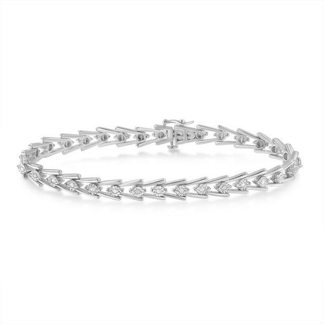 What makes this sterling silver bracelet so unique is the way each intricately detailed link flows into the next one for a...