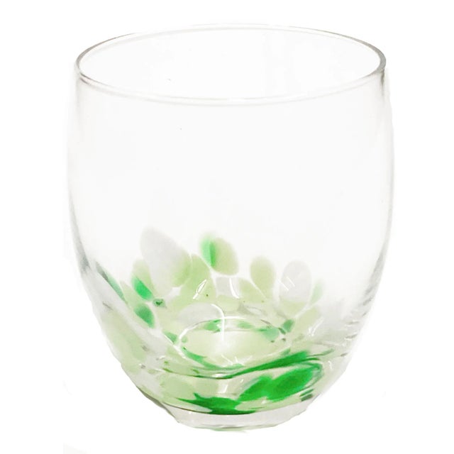 This stemless wine glass has a beautiful green and white contemporary design. Available in blue/white and green/white....