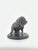 This charming bronze sculpture captures a tender and playful moment between two bears as they share a freshly caught fish....