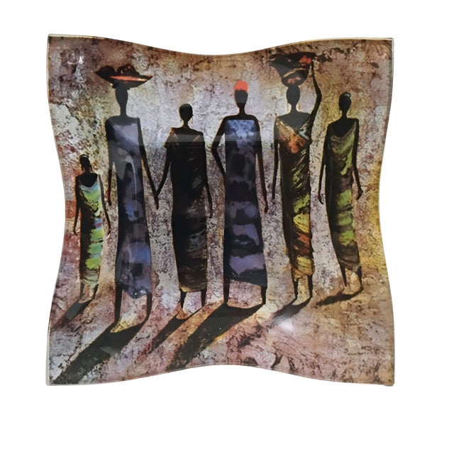 The African Tribal Tray is a beautifully crafted piece of fused glass art, featuring a tribal pattern in multicolor. This...