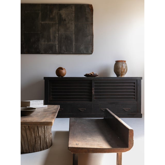 A beautifully aged Japanese sideboard from the Meiji period (1860–1900), crafted from solid cedar and featuring original...