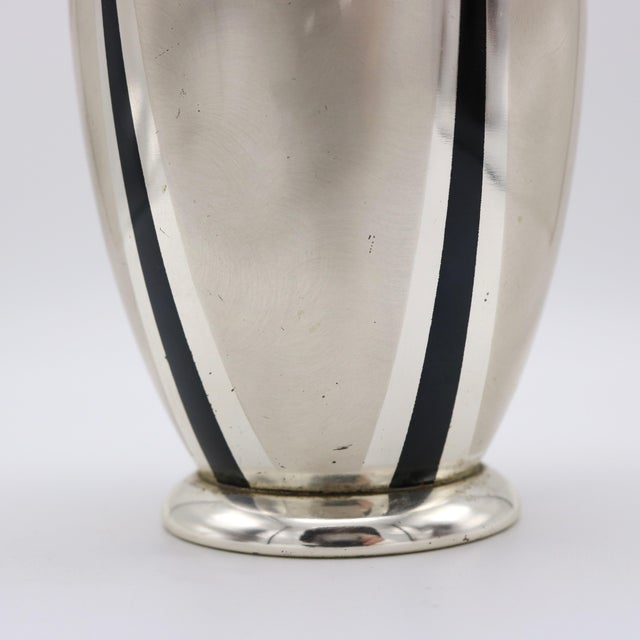 A WMF "Ikora” Art Deco mixed metal vase from Germany circa 1930. This Art Deco vase is Stamped : WMF Ikora Germany. WMF...