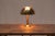 A beautiful example of mid-century German lighting, this brass table lamp was designed and manufactured by Florian Schulz...