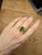 A beautiful engagement ring made with 14K yellow gold. The centerpiece of the ring features a 2.93-carat chrome tourmaline...