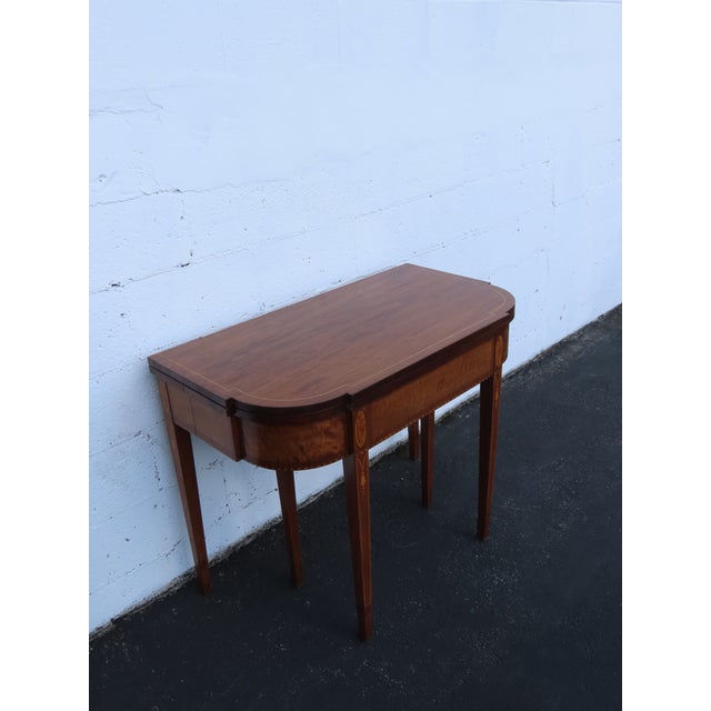 This Console Extension Table is made of wood, solid wood, mahogany, and veneer. This wonderful Table was made in the...