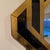 Black and gold geometriccframed mirror. Some bubbling under glass.